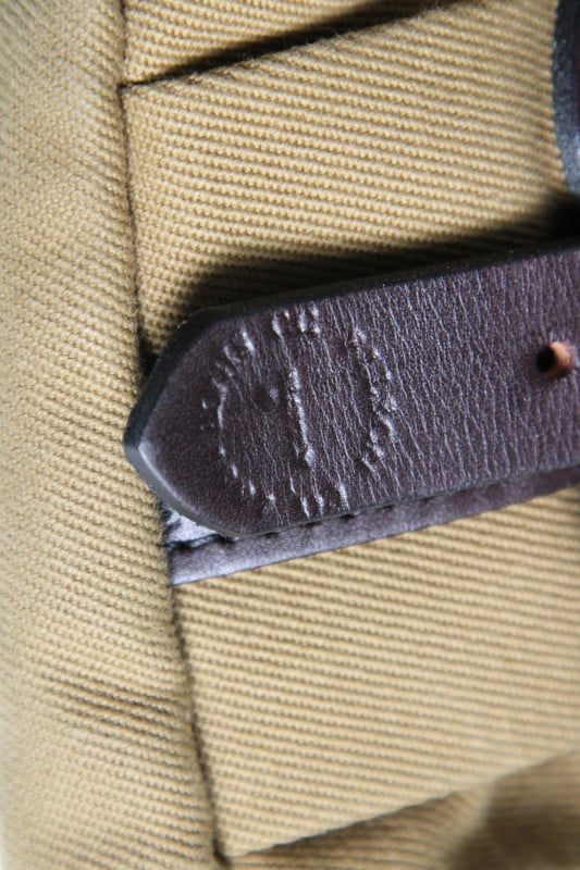 Filson's roll top bag. I've had it for around six years. The twill has  broken in nicely and has handled admirably even in downpours without so  much as getting anything wet inside. 