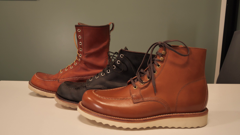 Grand Stone Brass Boot next to red wing's moc toes