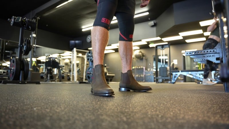 Squatting in leather sole chelseas