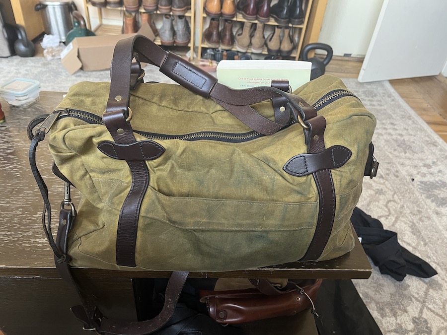 filson 48hr tin cloth duffle straps