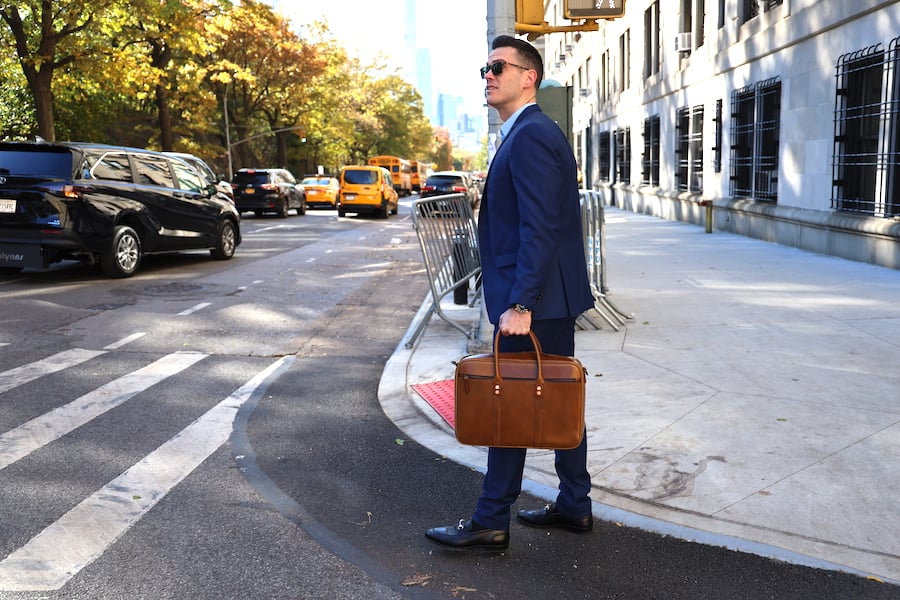 satchel and page counselor briefcase with suit with loafers