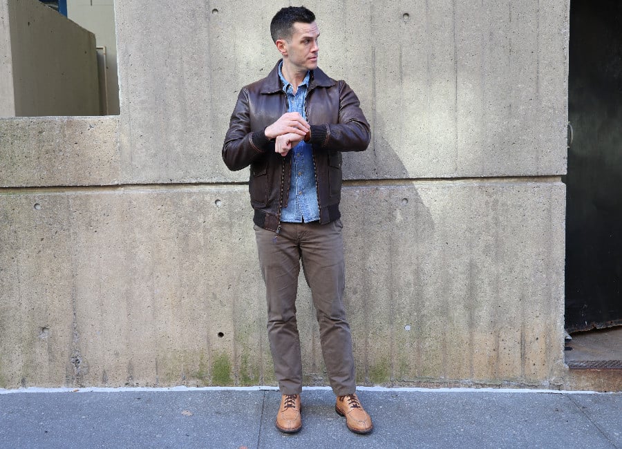 Light washed Flint & TInder denim shirt, leather jacket, brown chinos, and Grant Stone Ottawa boots.