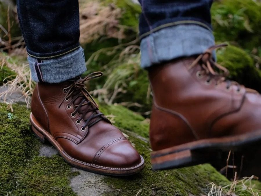 Ticho Blanco's Viberg Service Boots on a mossy rock in use