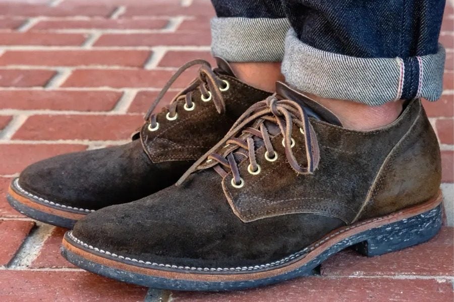 Viberg and withered fig collab shoe on foot with cuffed pants 